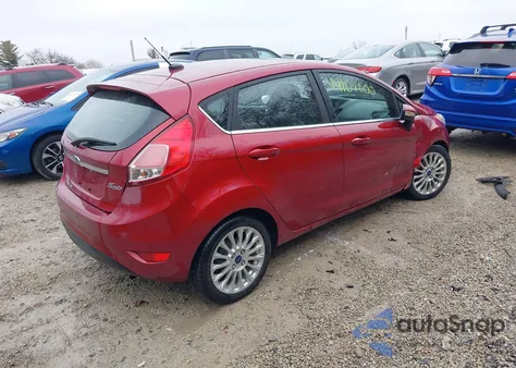 2015 Ford Fiesta Titanium из США, поврежденный, VIN 3FADP4FJ9FM210743